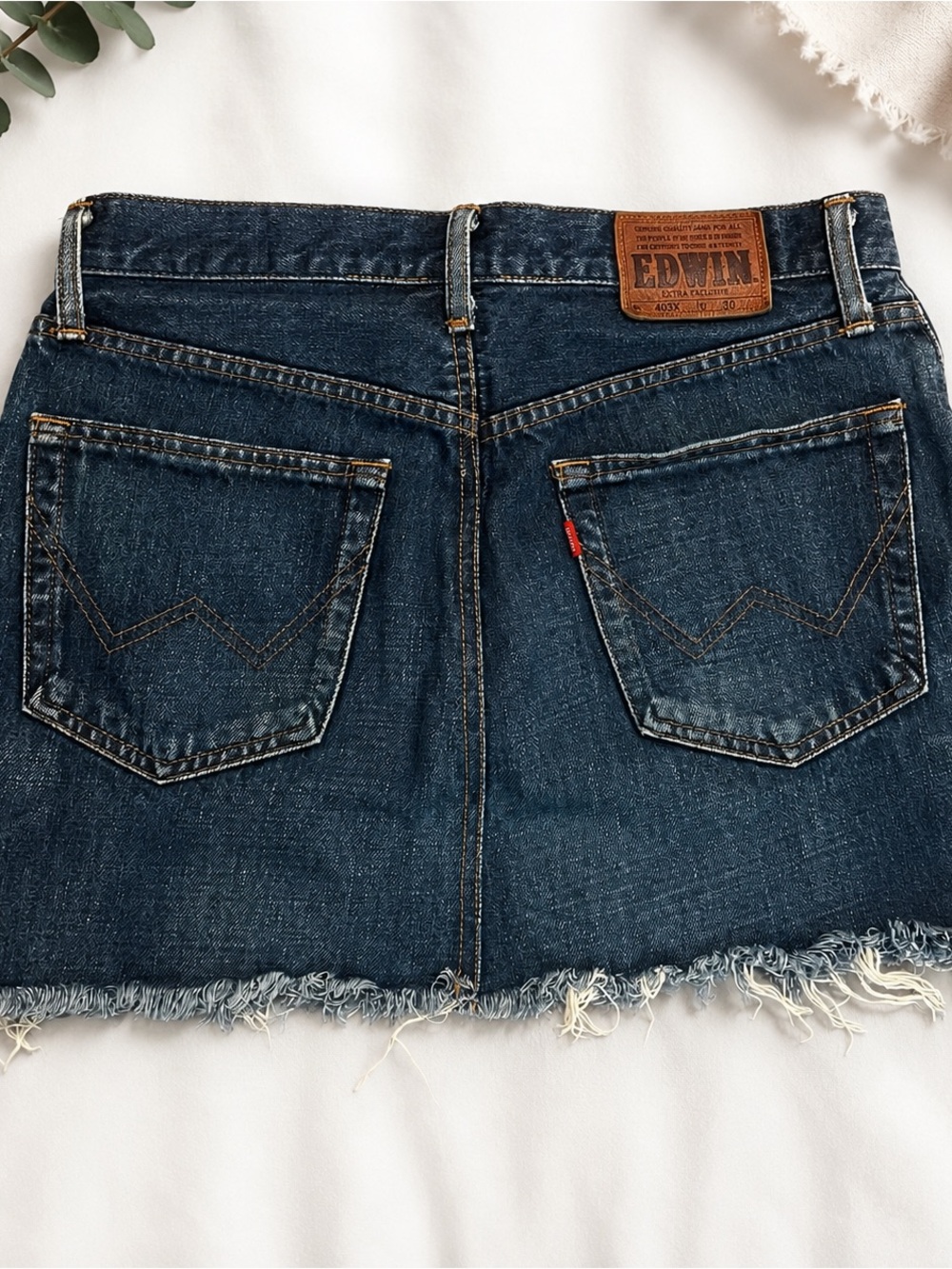 Edwin Indigo Denim Mini Skirt with Frayed Hem